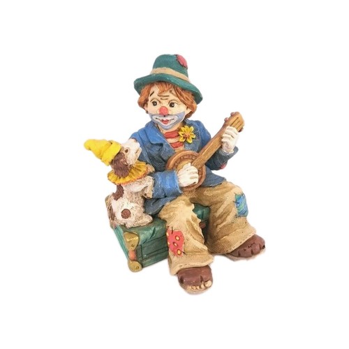 Statuina cane corde musicali