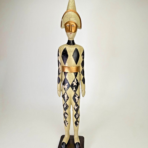 Statua giullare arlecchino